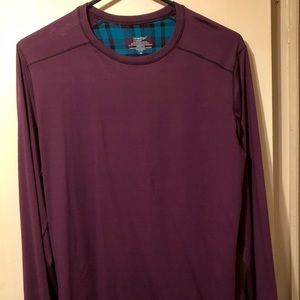 Long sleeve purple top.